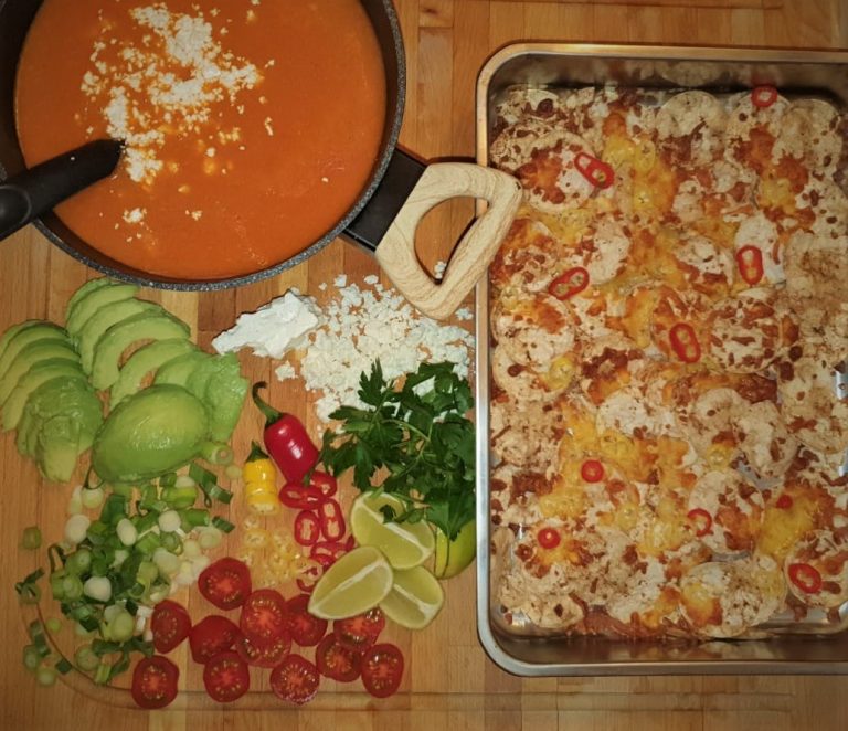 Mexican enchilada with guacamole and salsa.