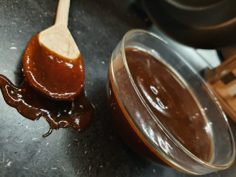 caramel sauce, wooden spoon